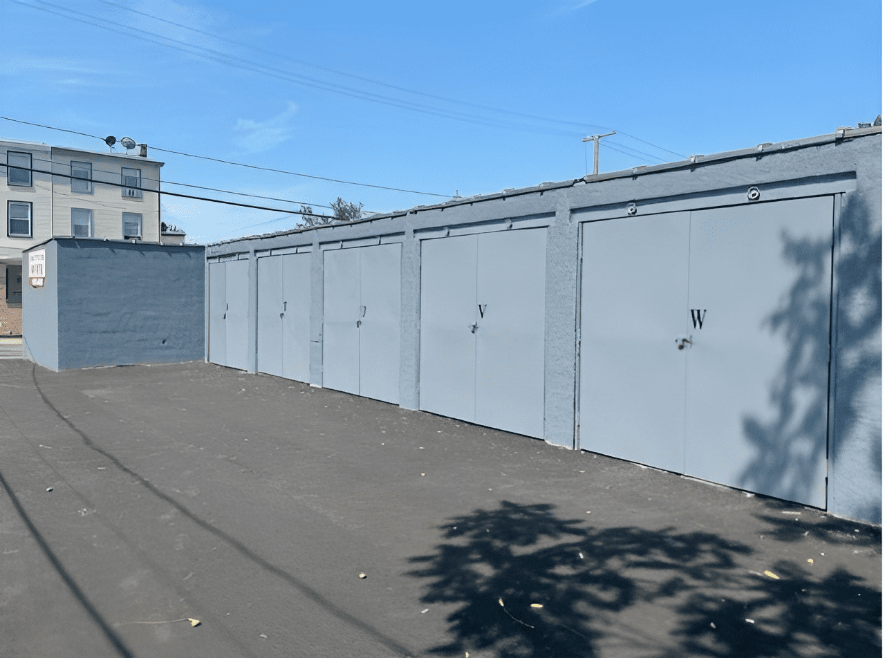 A row of storage units on the side of a building.